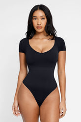 Kurzärmliger, ultraformender Push-Up-Bodysuit – Schwarz